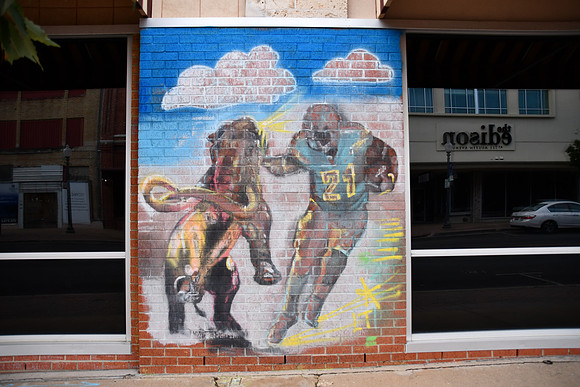 Football Player and Mammoth 0001